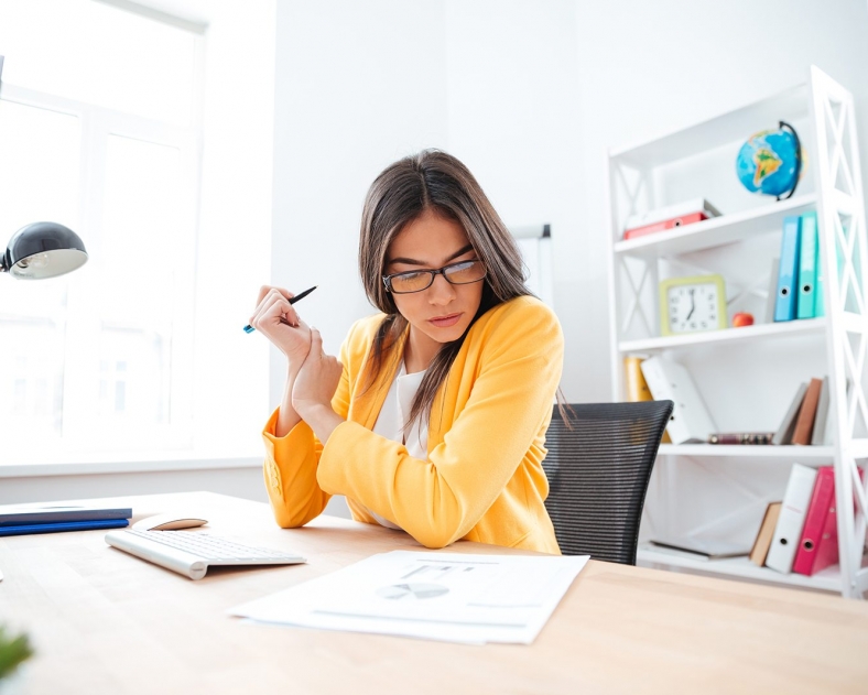 Businesswoman analysing document